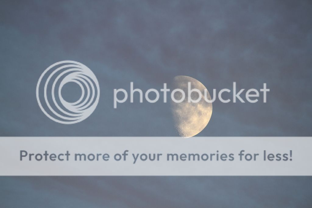 IMAGE: http://i574.photobucket.com/albums/ss187/pastymen/150-500%20shots/moonandcloud.jpg